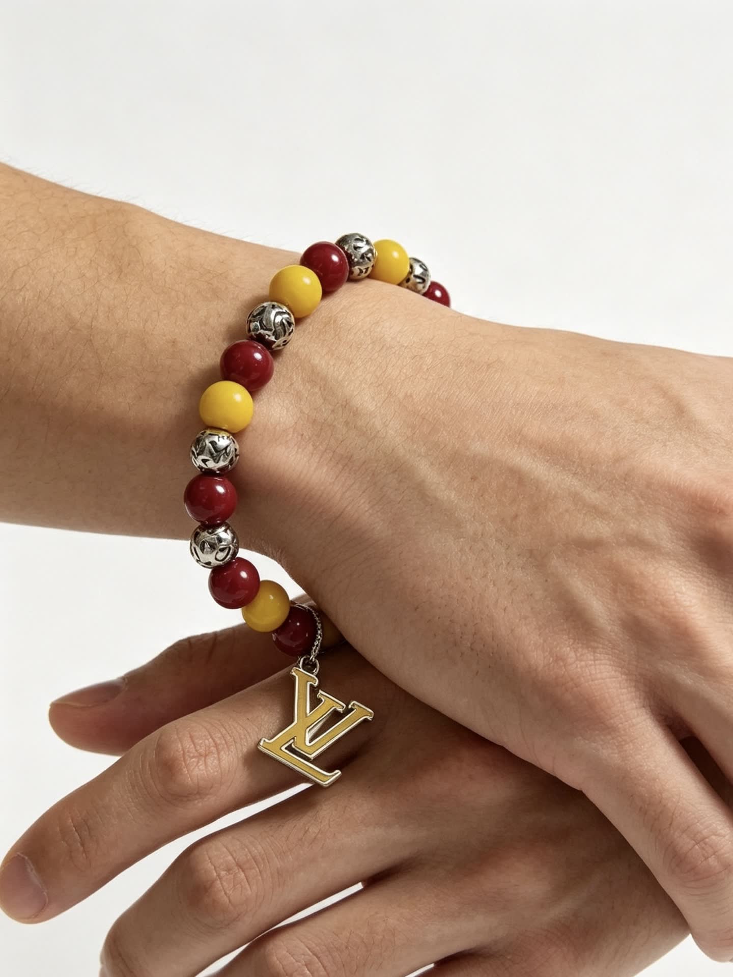 Louis Vuitton Beaded Bracelet with Monogram Charm
